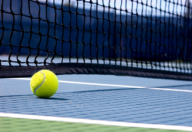 Playing Tennis in Green Trails Estates