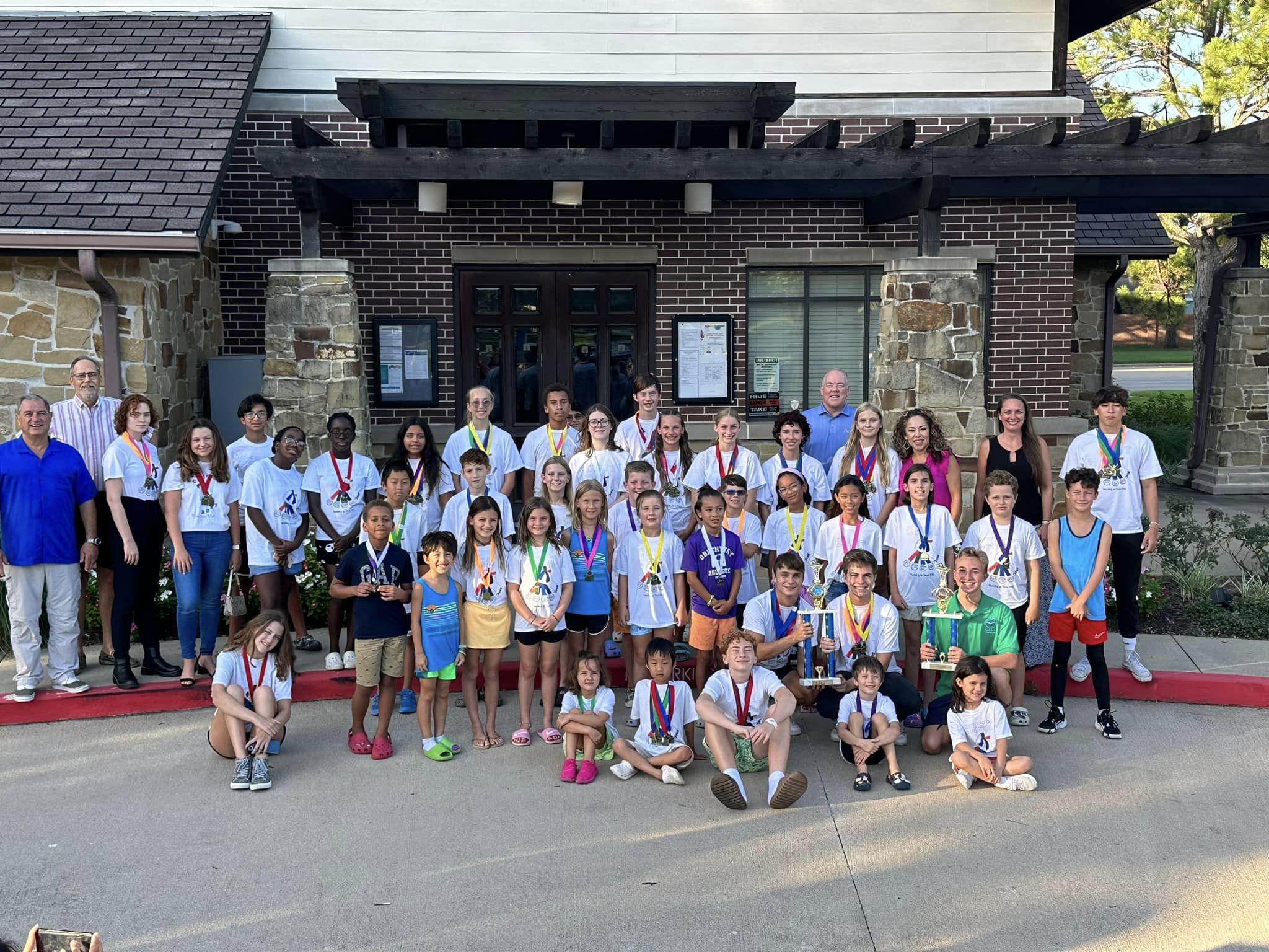 Cinco Ranch Swim Team Attends HOA Meeting as Special Guest